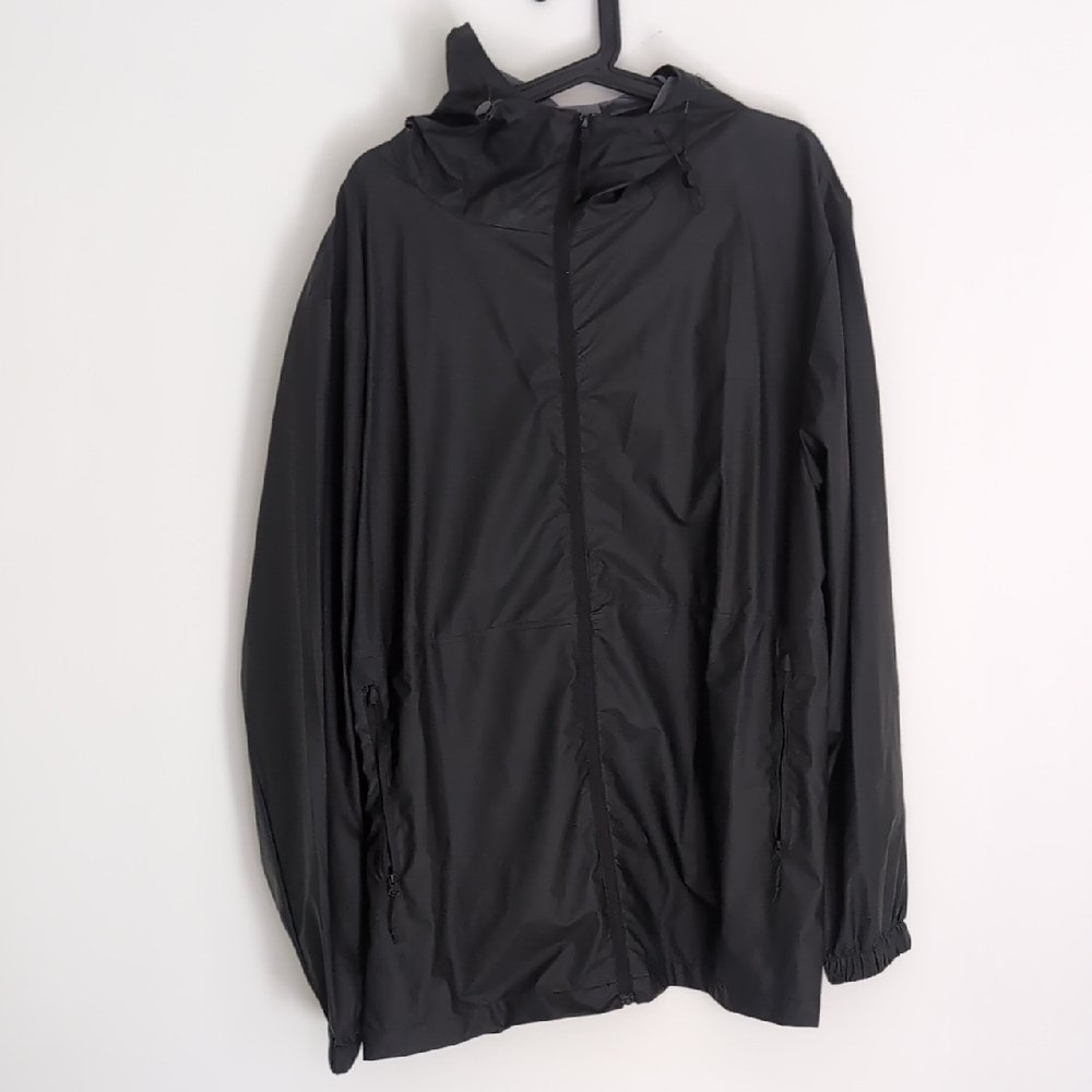 Rains Black Raincoat Minimalist Weather-Resistant Design